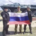 Передача Флага России из зоны СВО