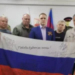 Передача Флага России из зоны СВО