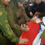 Передача Флага России из зоны СВО